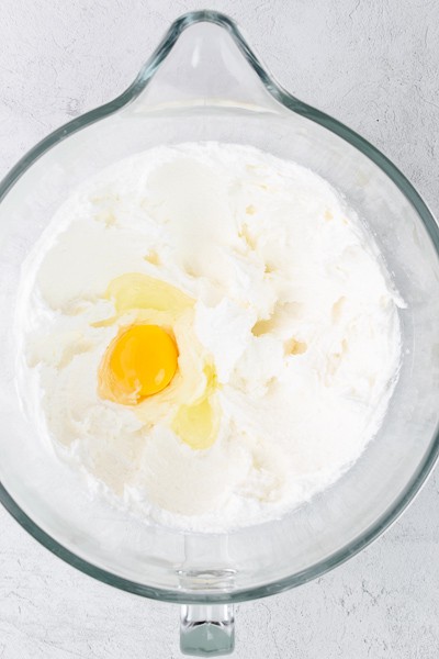 Egg added to butter, oil and sugar mixture