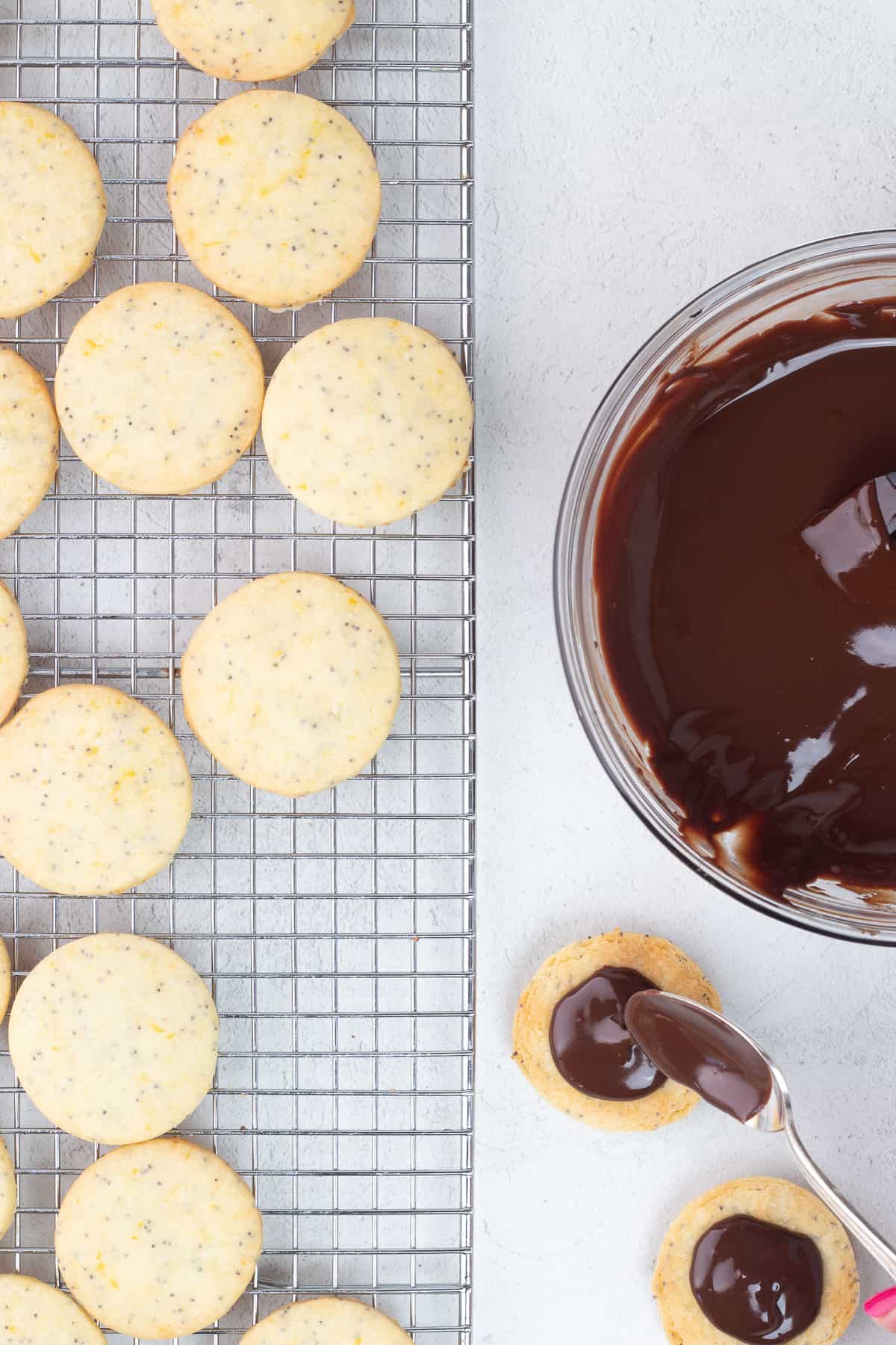 cookies being filled with chocolate ganache 