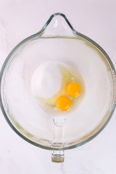 Sugar and eggs in large mixing bowl