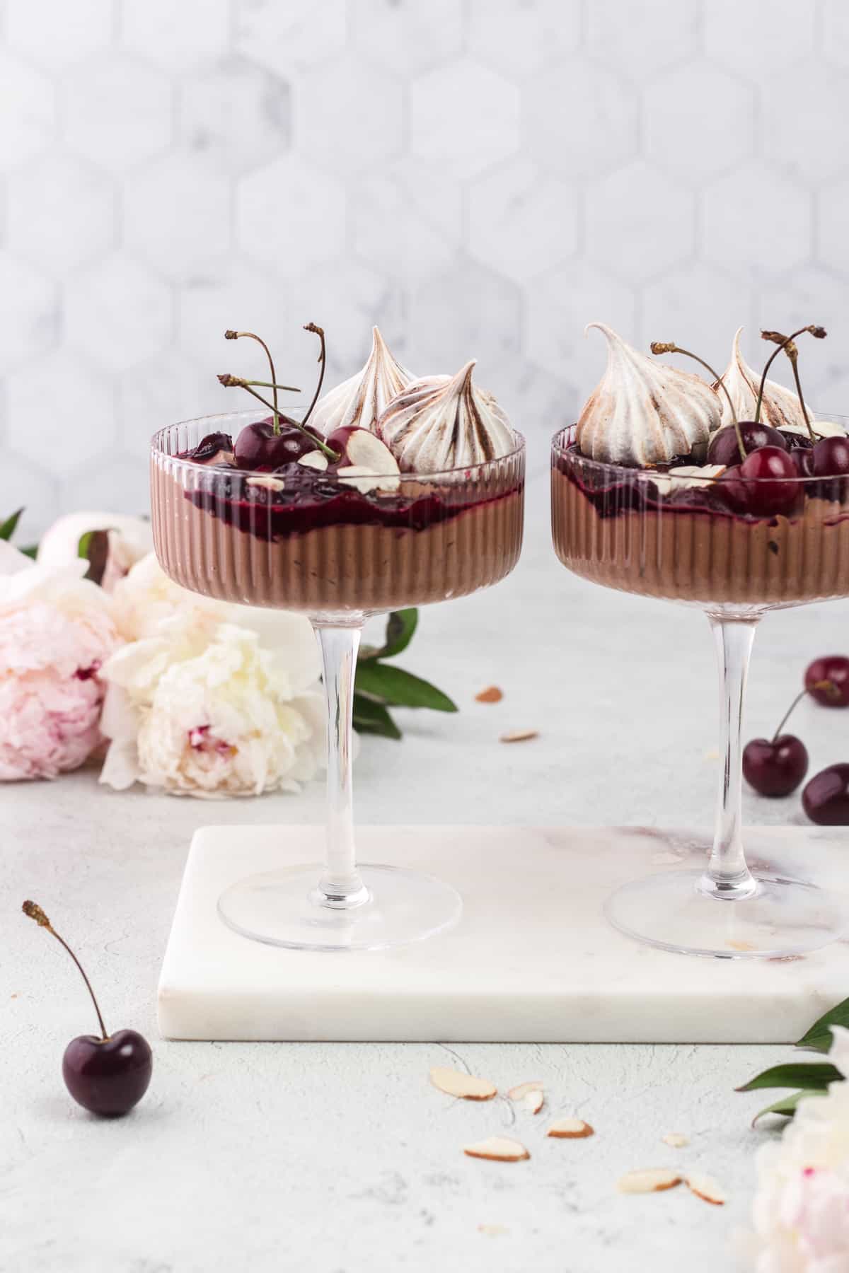 Two Black Forest Eton Mess in a coupe glass and on a round marble tray