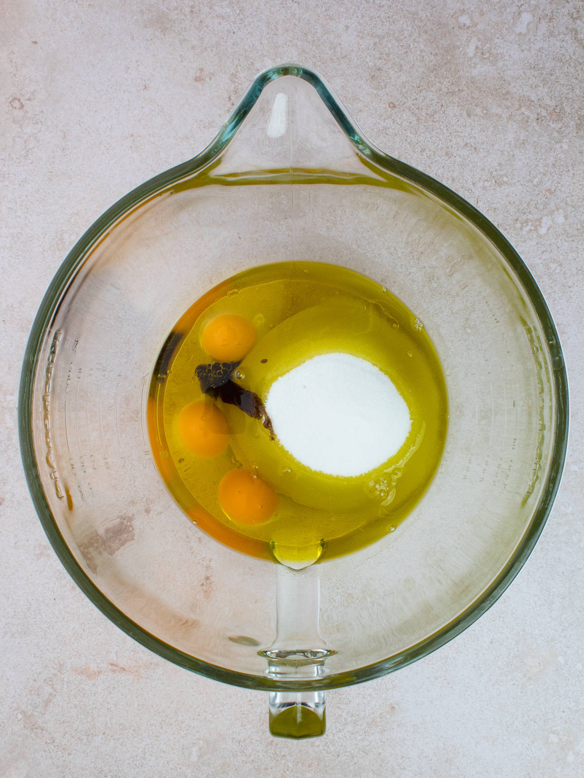 Olive oil, eggs, sugar and vanilla in large mixing bowl