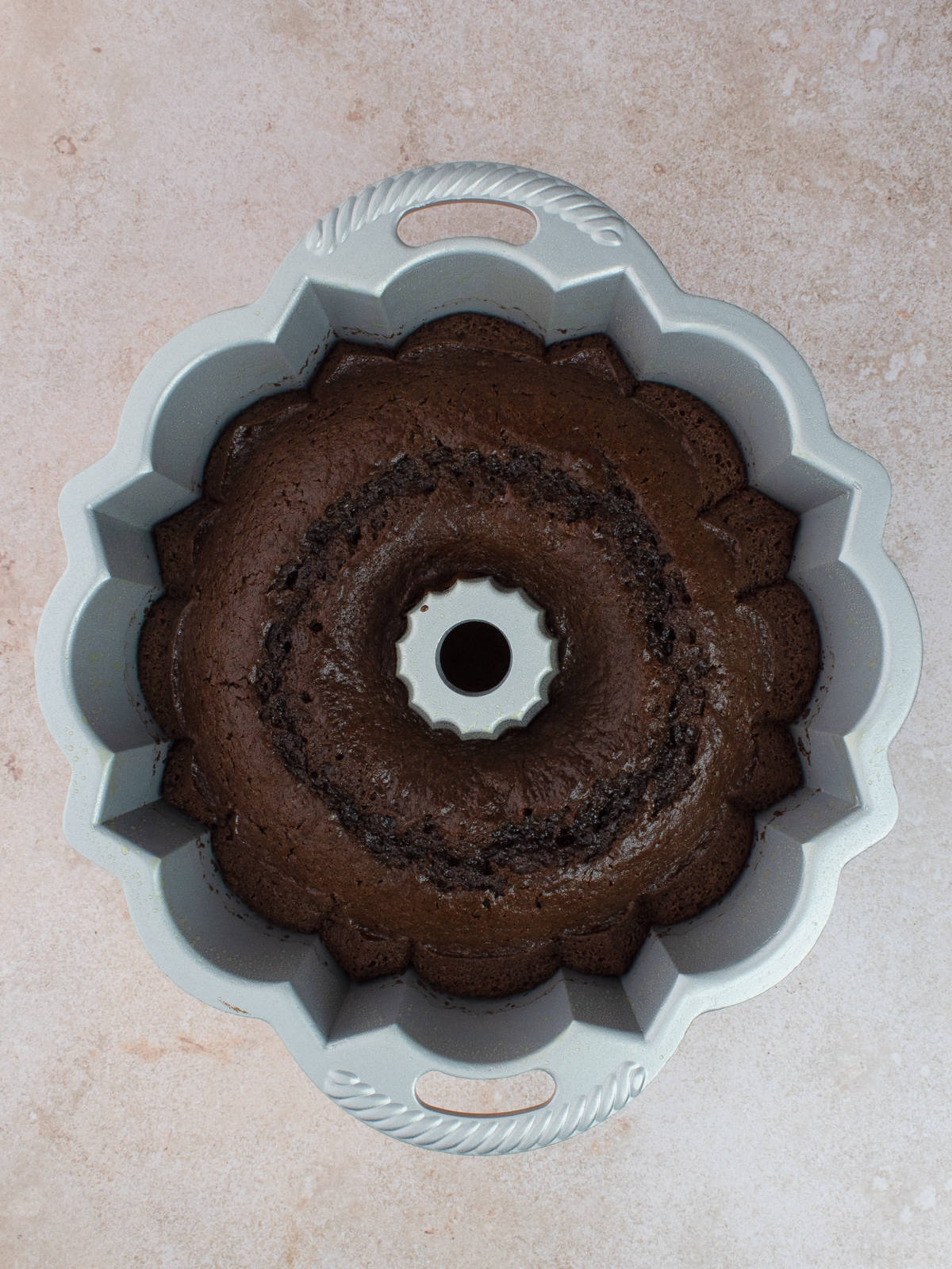 Baked chocolate olive oil cake in bundt pan
