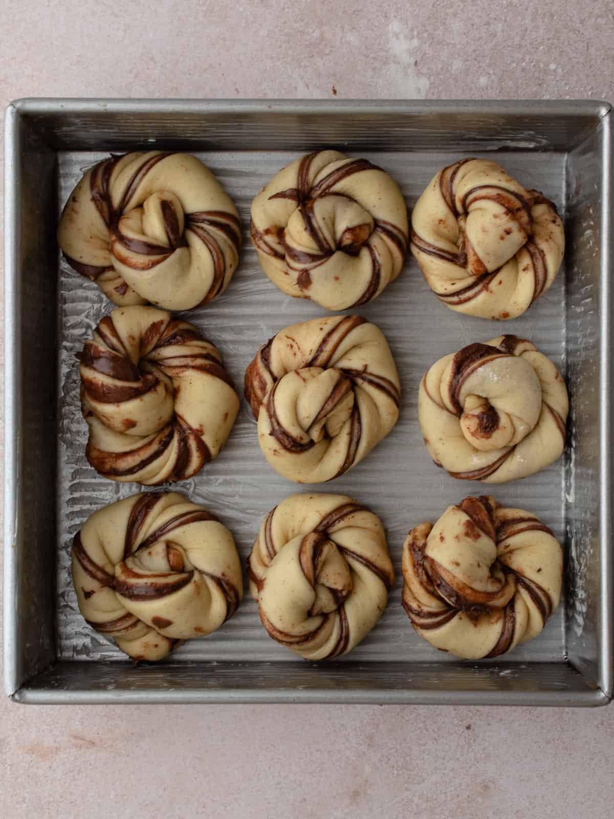 Unproofed Nutella knots in square pan