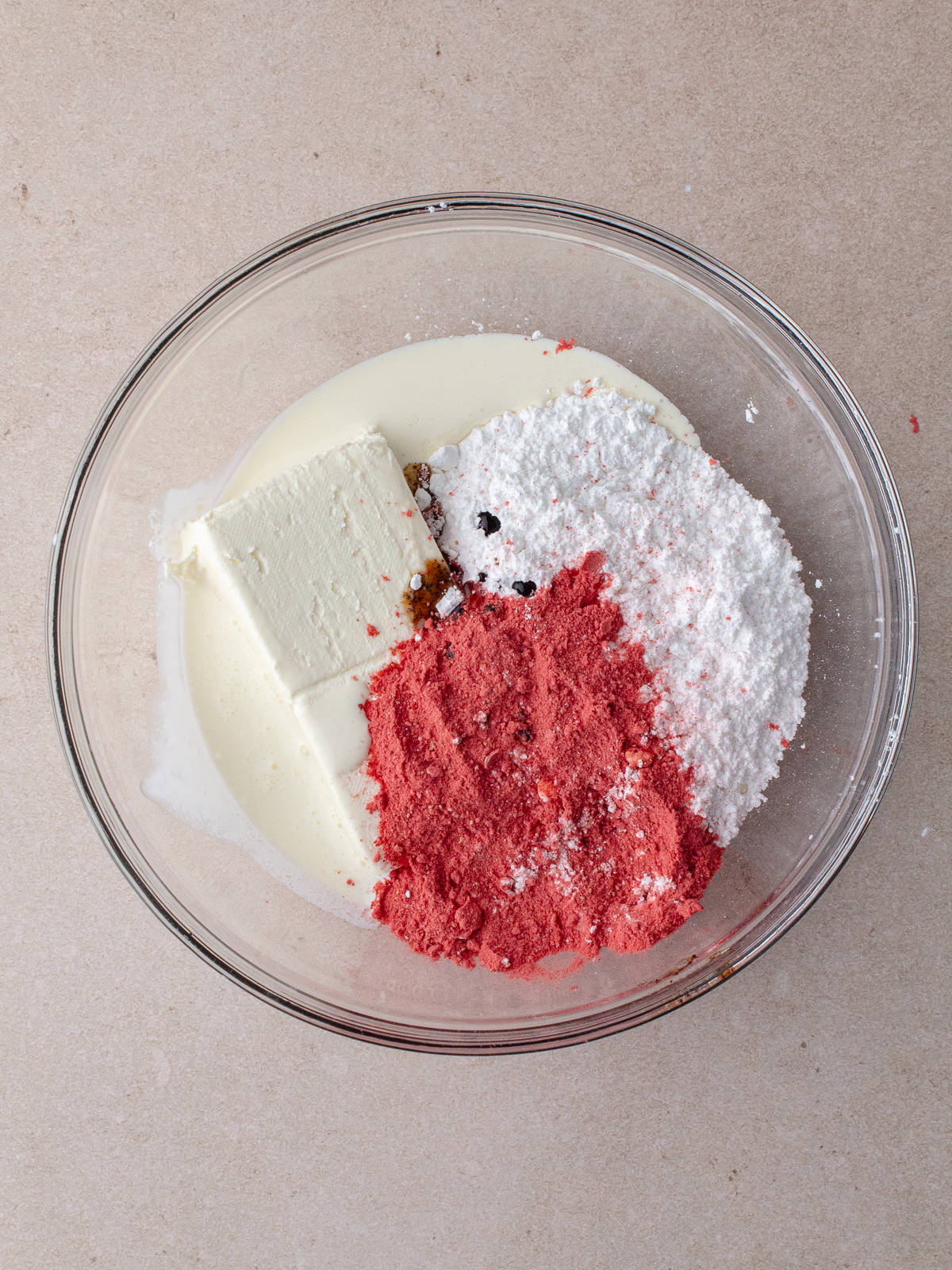 Strawberry cheesecake filling ingredients in medium bowl
