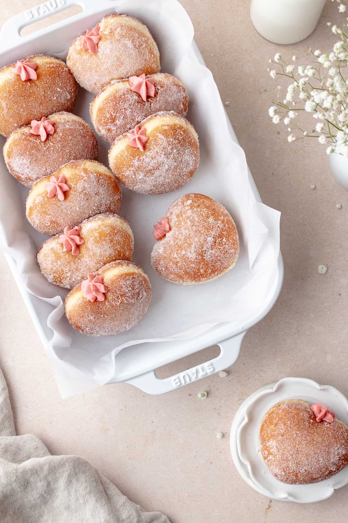 Strawberry cheesecake donuts in baking dish