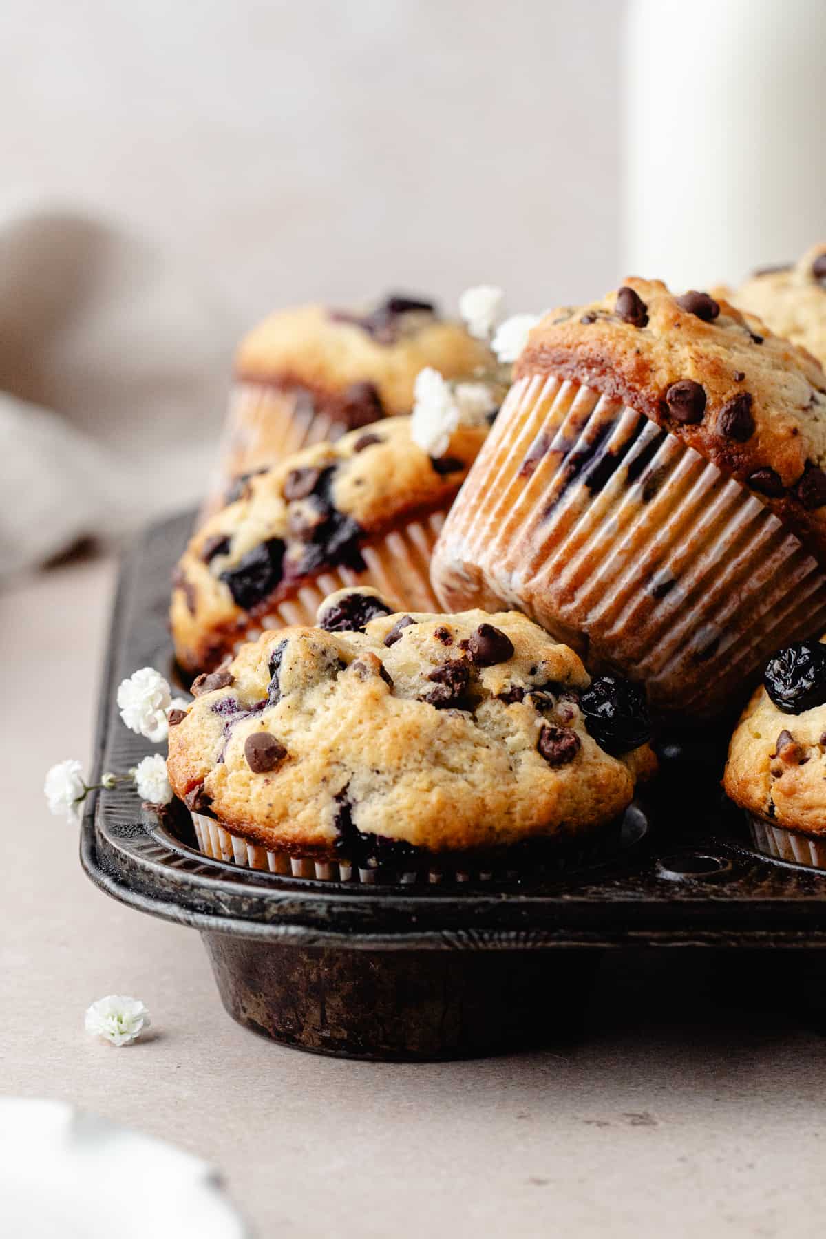 Blueberry chocolate chip muffins in muffin pan