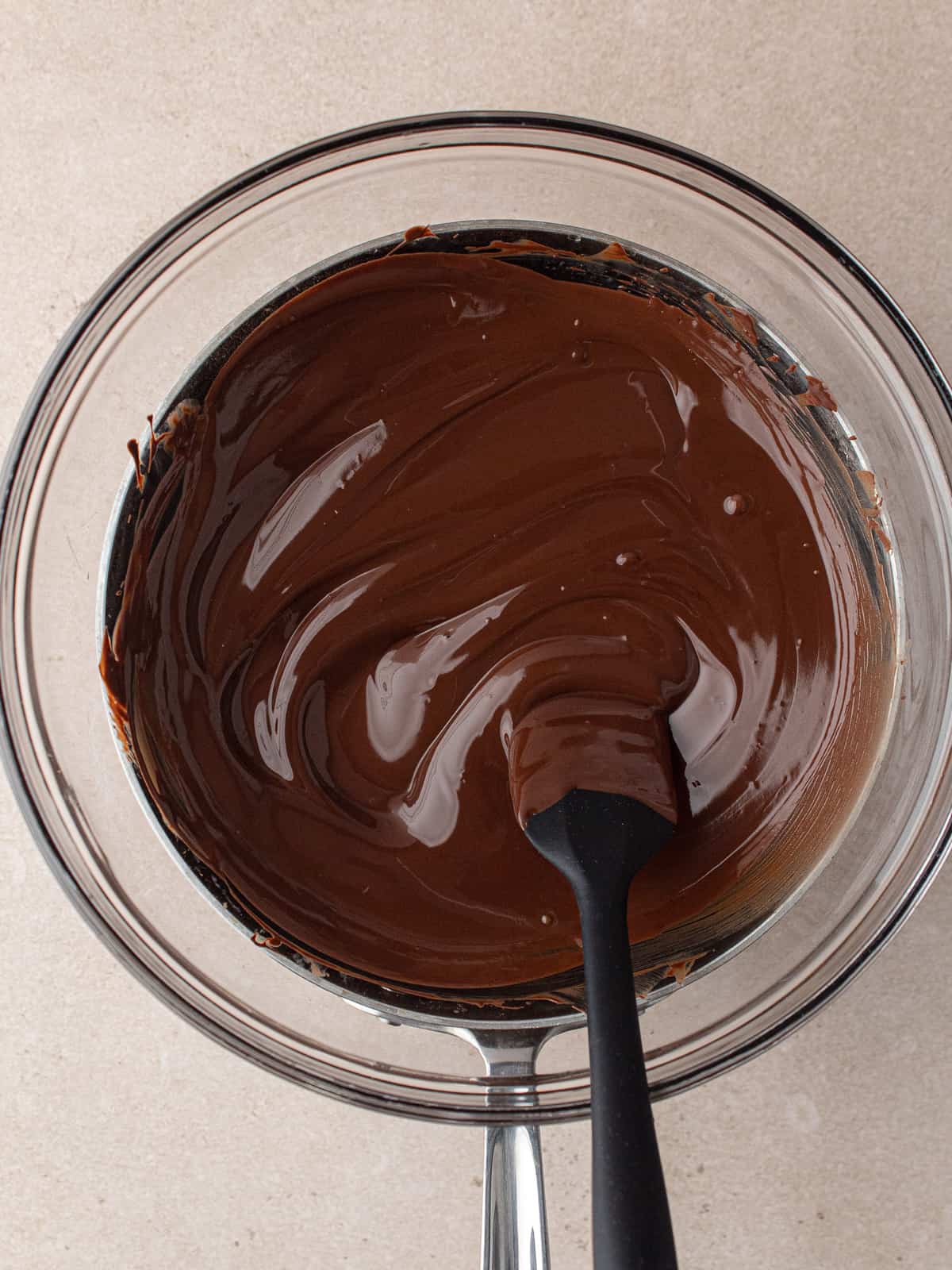 Melted chocolate over a double boiler.