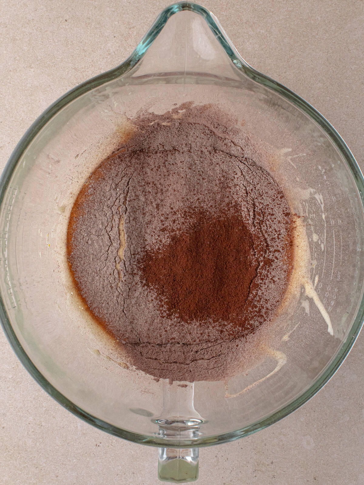 Sifted flour, cocoa powder, baking powder and salt added to whipped sugar and egg mixture.