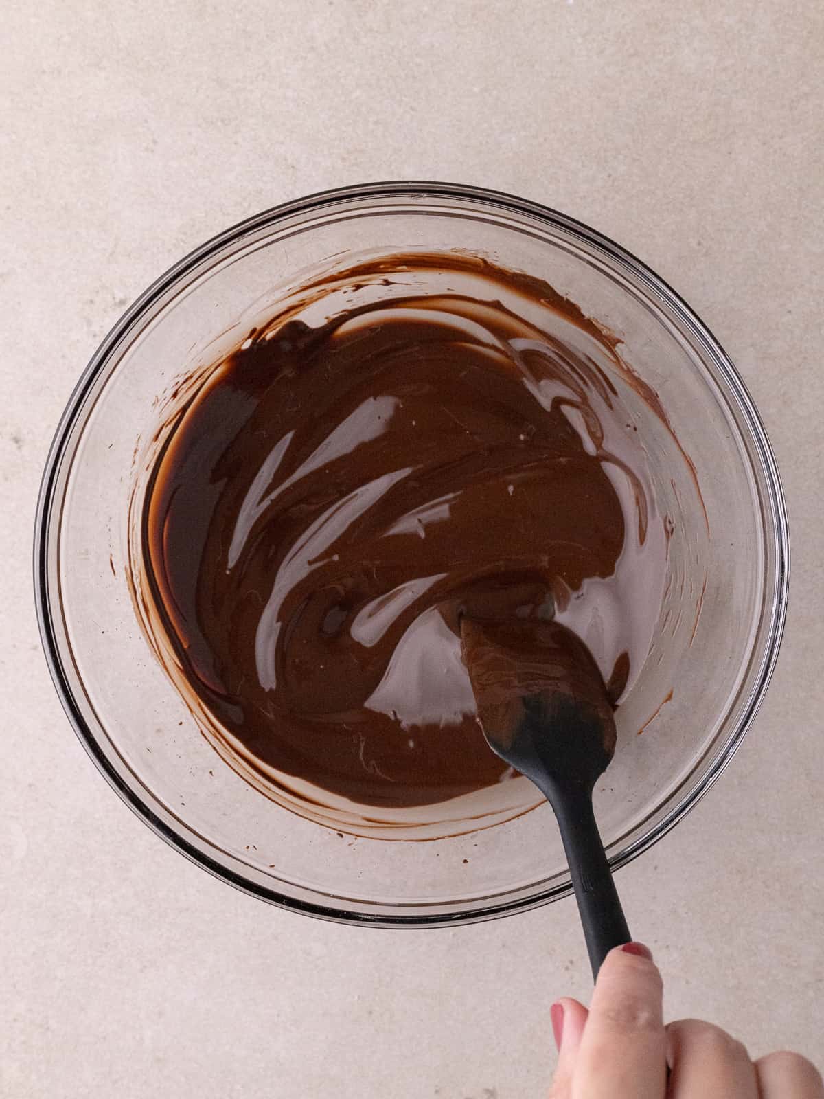 A small bowl of melted chocolate.