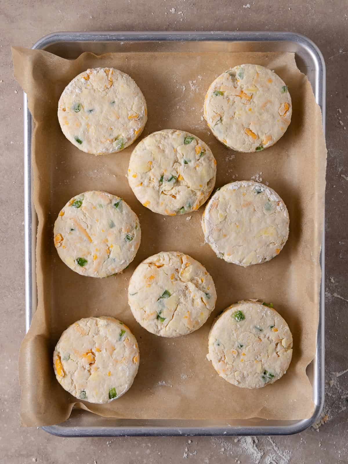 Biscuits are placed on a tray and ready for the freezer.