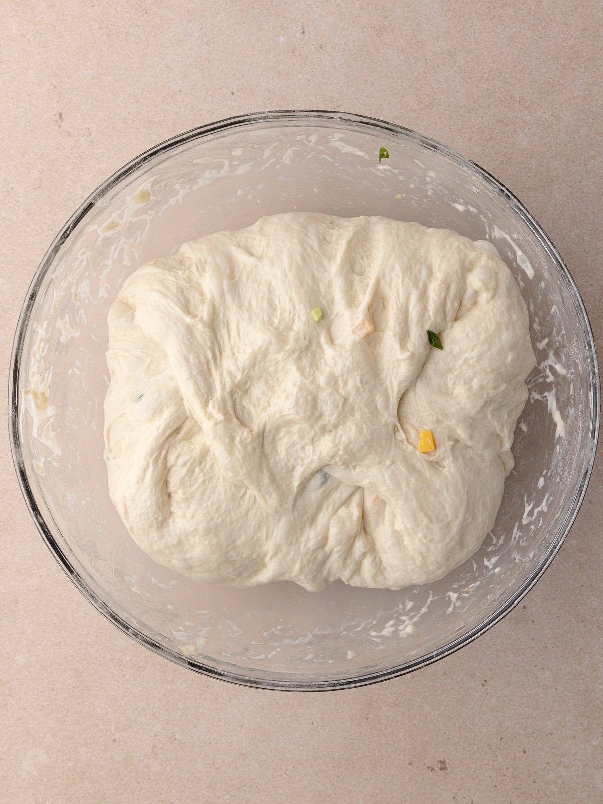 The dough stretched and folden one last time before it gets transferred to a baking pan.