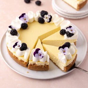 Almond cheese slices sitting in a serving plate featured photo.