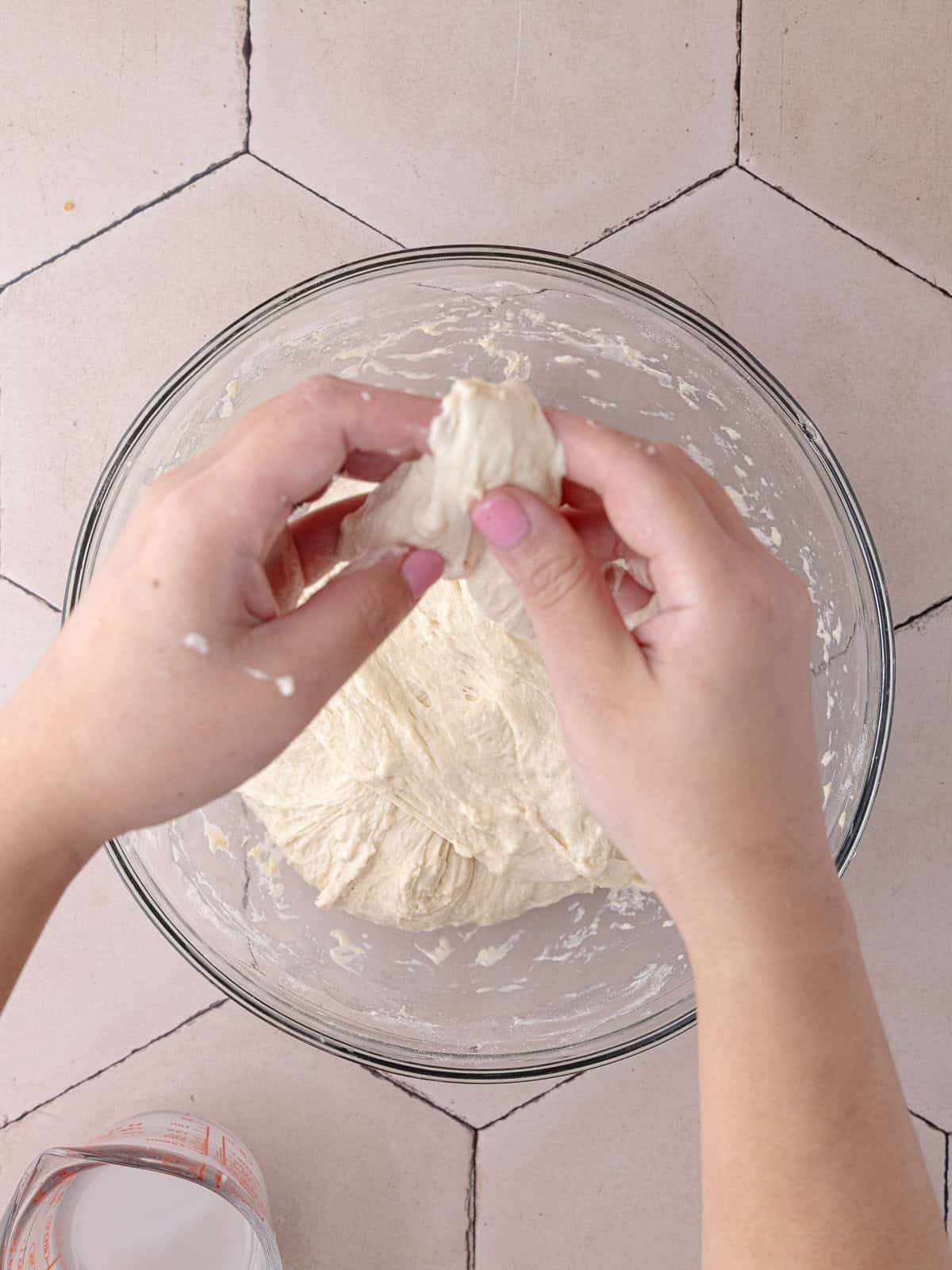 The schiacciata bread dough goes through a set of 4 stretch and folds to strengthen the structure.