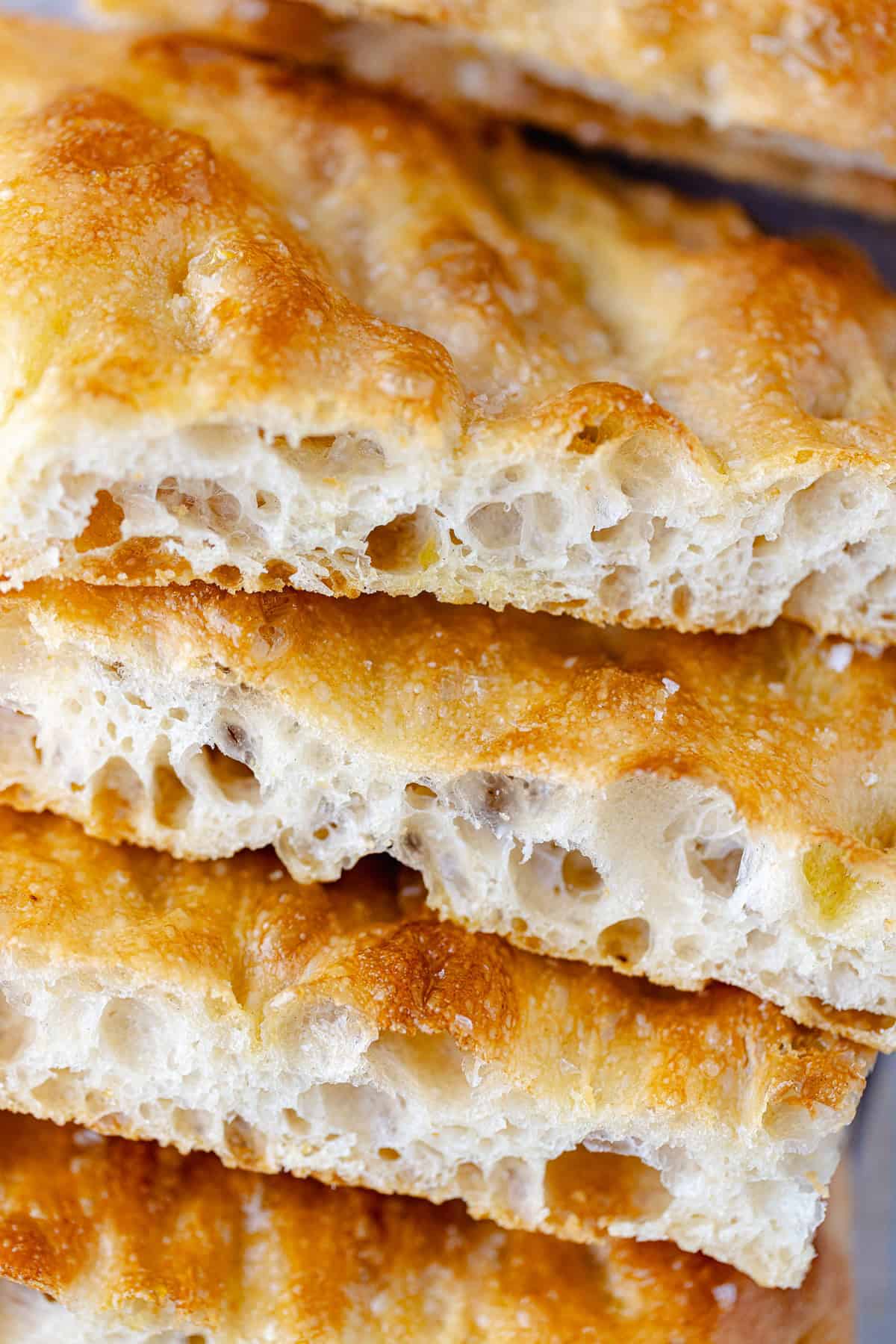 Schiacciata bread recipe sliced into pieces.