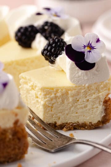 Almond cheese slices sitting in a serving plate featured photo.