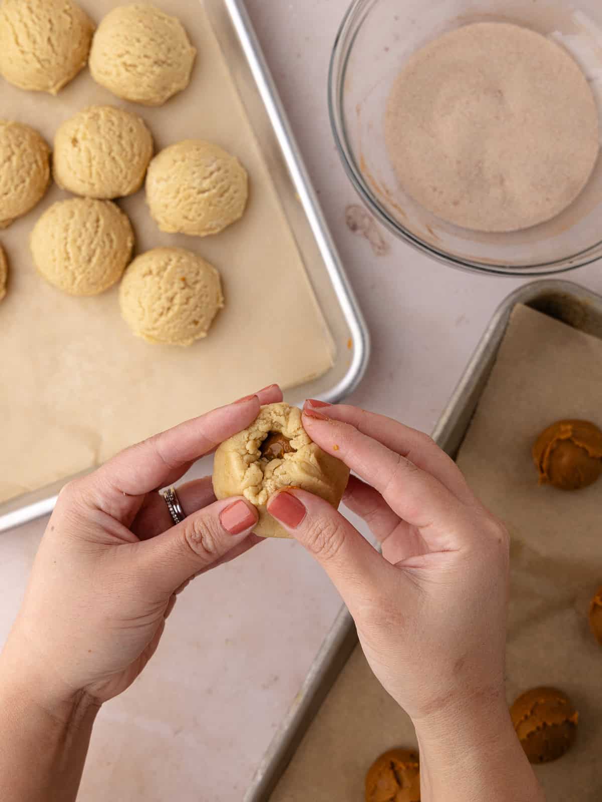 Snickerdoodle cookie dough balls are stuffed with dollops of Biscoff cookie butter.
