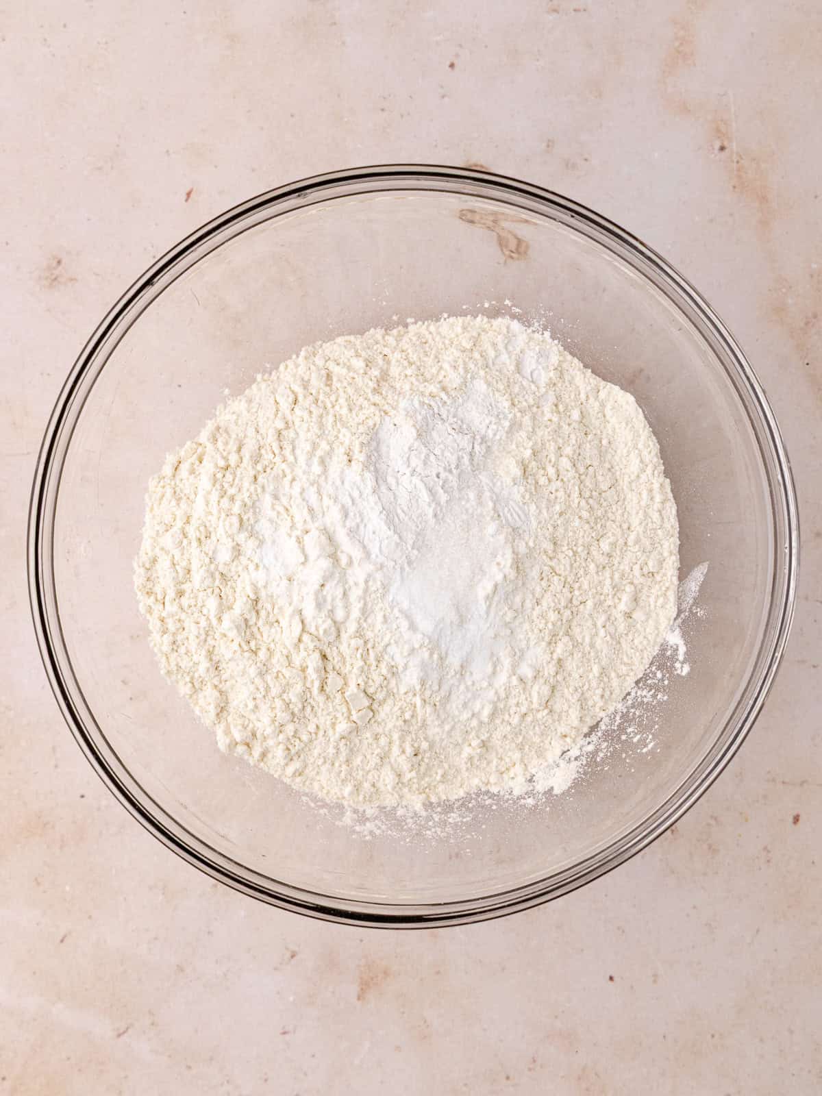 All-purpose flour, cream of tartar, baking soda and salt are in a small mixing bowl.