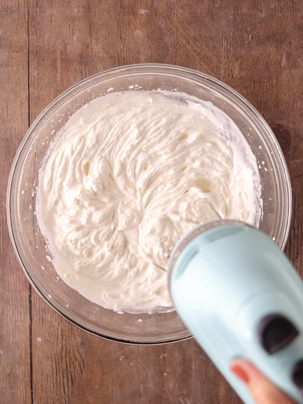 Heavy cream and a bit of powdered sugar whipped together until firm peaks.