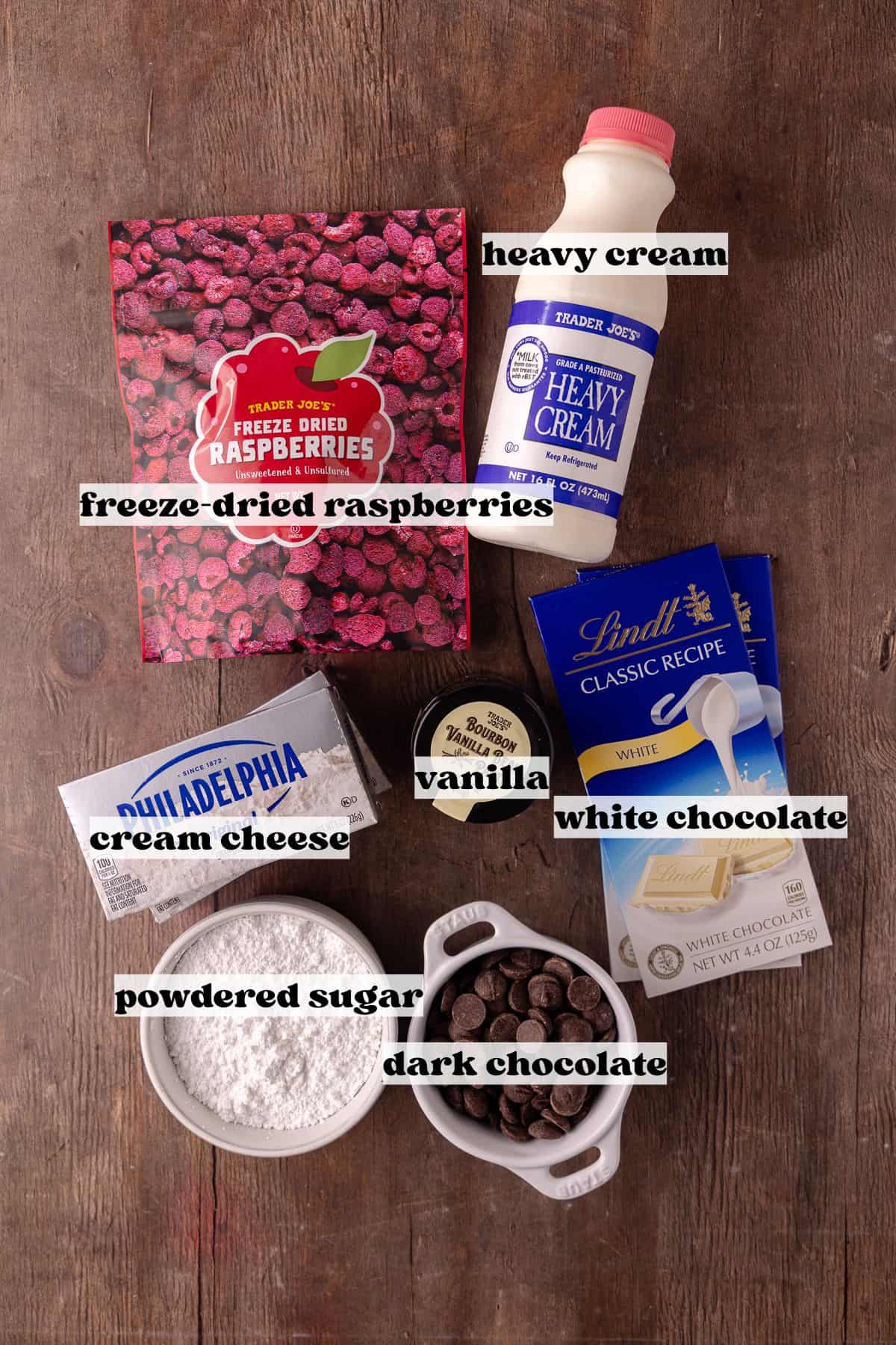 Raspberry white chocolate mousse filling and chocolate ganache ingredients which include, white chocolate bars, cream cheese, heavy cream, powdered sugar, freeze-dried raspberries, vanilla, and dark chocolate chips.