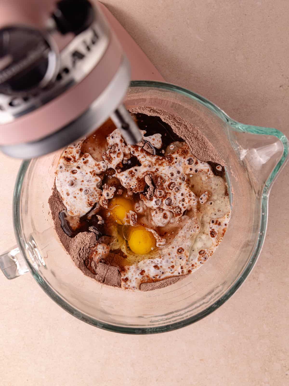 Buttermilk, eggs, oil and vanilla are added to the bowl of dry ingredients.