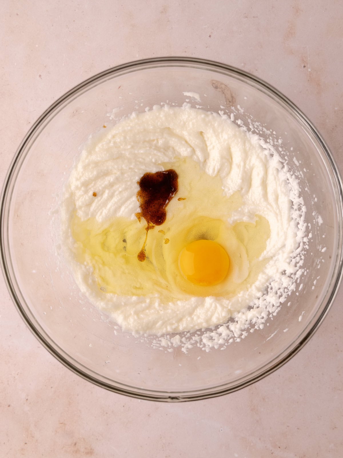 A whole egg, an egg white and vanilla is added to the butter sugar mixture.
