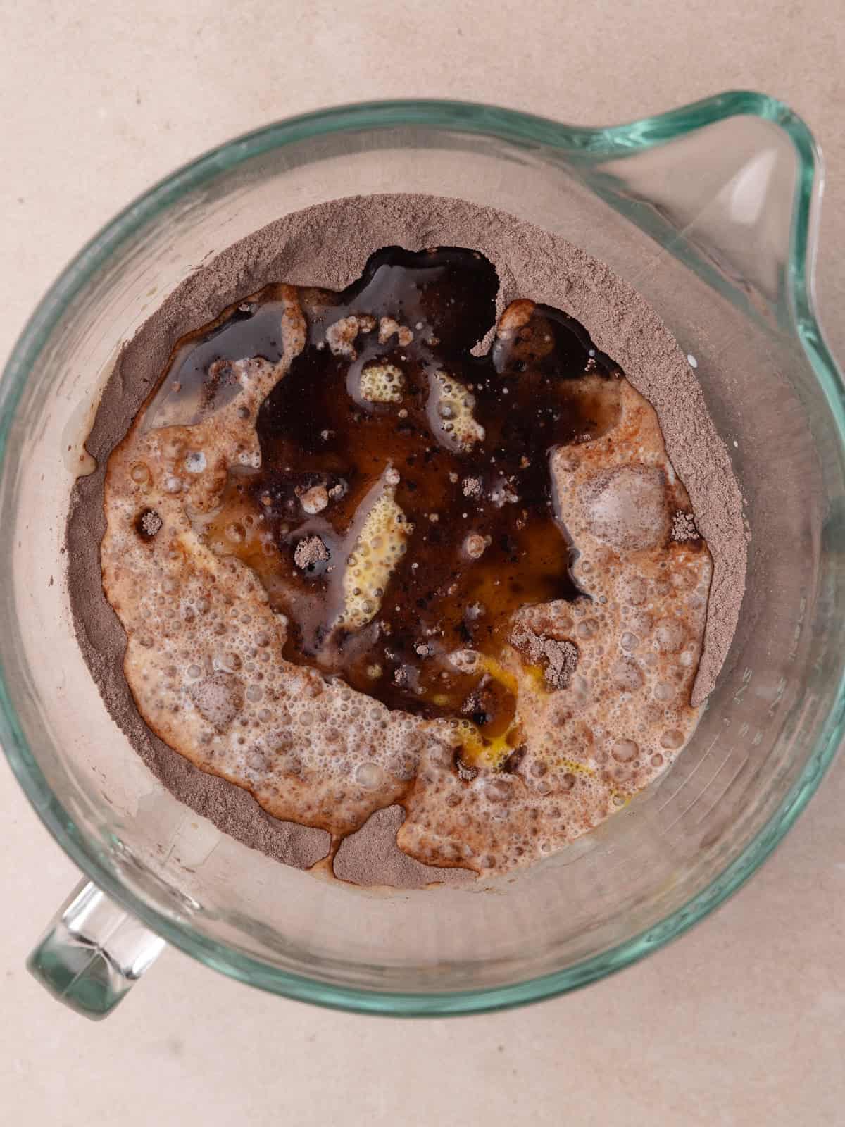 Buttermilk, eggs, oil and vanilla are added to the bowl of dry ingredients.