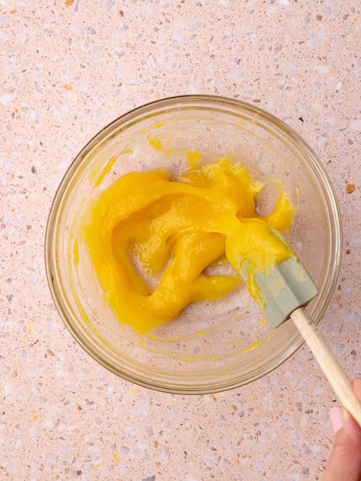 Peach puree and tapioca flour is combined together is in a small bowl and is heated in the microwave until thickened.