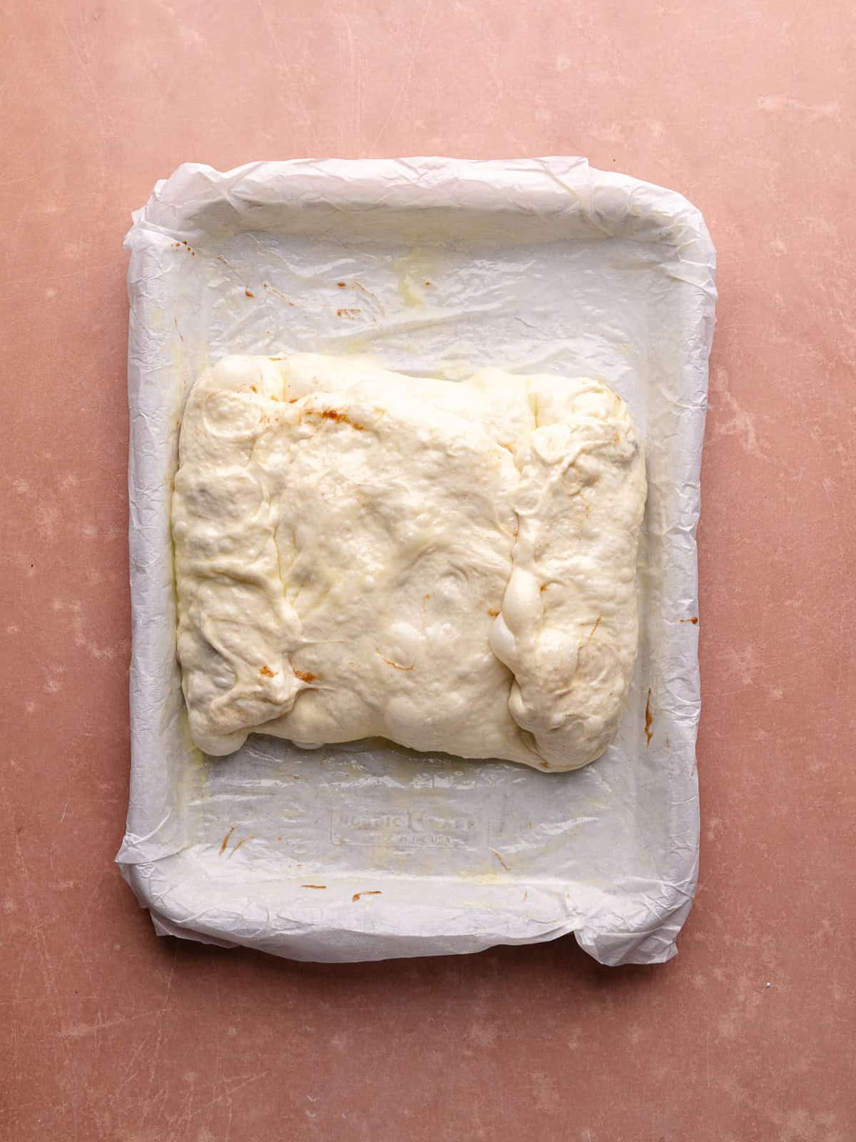 Apple fritter focaccia is stuffed with cinnamon apple filling.