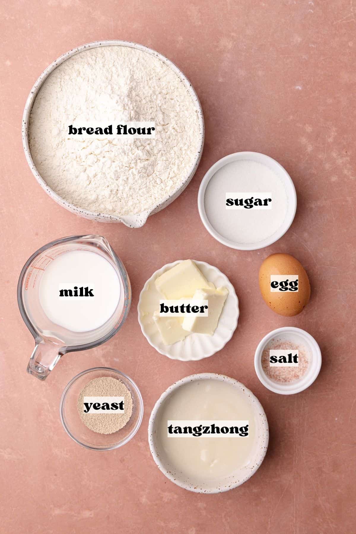 Maple bar donut dough ingredients which include, bread flour, tangzhong, milk, yeast, salt, butter, egg and sugar.