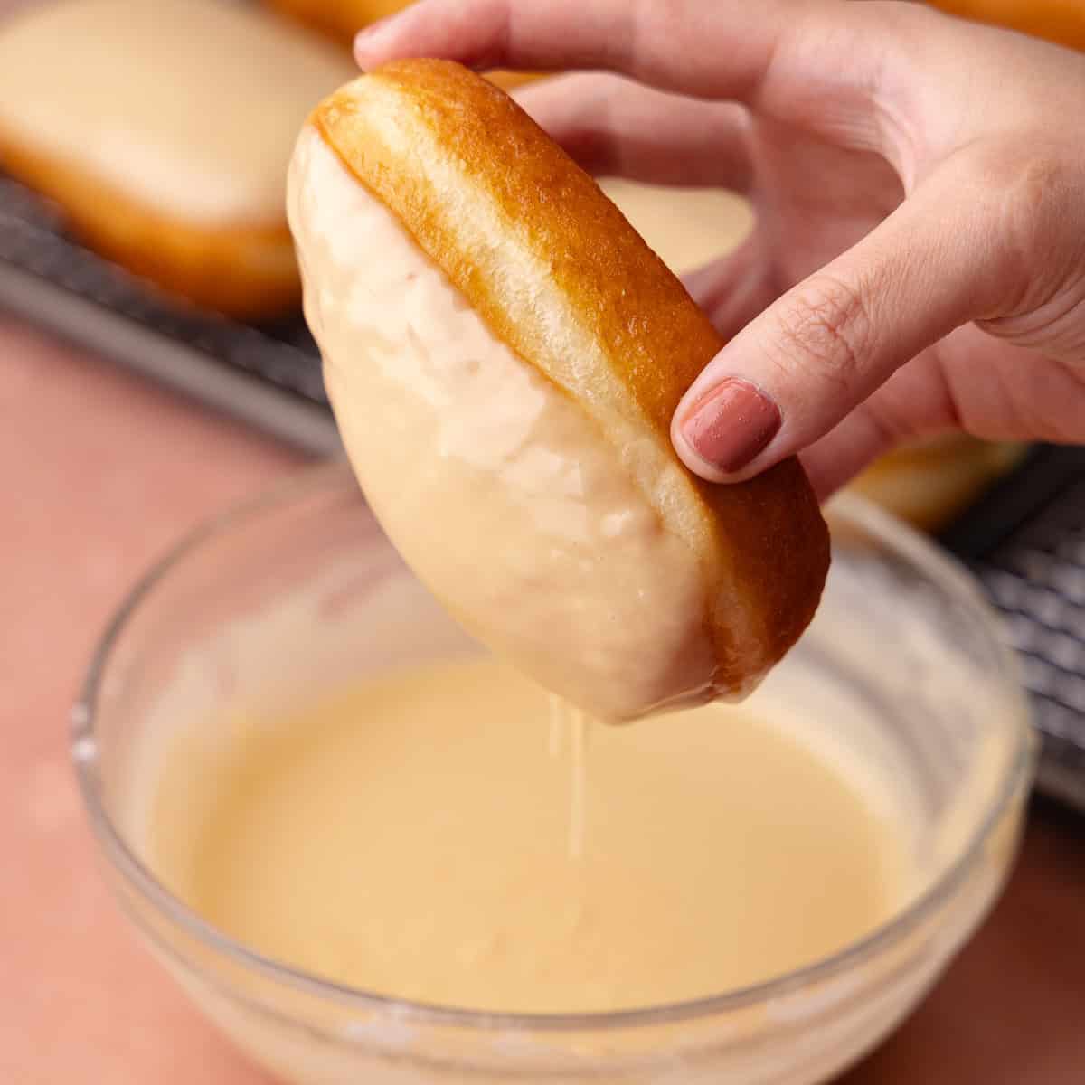 Maple donut bars are filled with vanilla pastry cream and dipped in a maple icing.